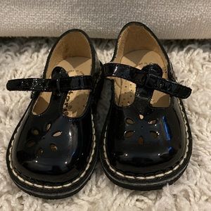Patent leather toddler shoes.